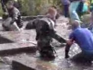 grubbyfacekid grubby face activities commando challenge devon people journeying through a muddy water filled pipe