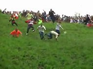 grubbyfacekid grubby face activities gloucestershire cheese rolling people chasing falling down steep grassy hill